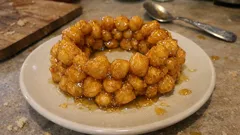 Nogado de Natal com mel: tiras fritas crocantes com o mel no ponto certo