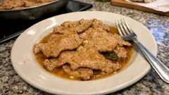 Bifanas no tacho à moda do Porto: tenras, bem douradas e com molho para pão