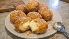 Sonhos recheados com creme de amêndoa: receita caseira para dias de festa