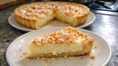 Tarte delícia de coco: cremosa e com base estaladiça, pronta em cerca de 40 minutos
