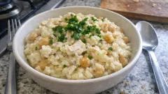 Arroz de bacalhau com grão: malandrinho, cremoso e cheio de sabor num tacho só