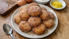Malassadas fofas e douradas: a receita com toque de limão e açúcar-canela