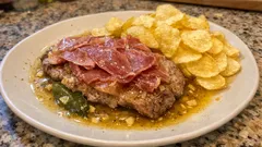 Bifes à portuguesa na frigideira: molho de vinho branco, alho e louro em 15 minutos